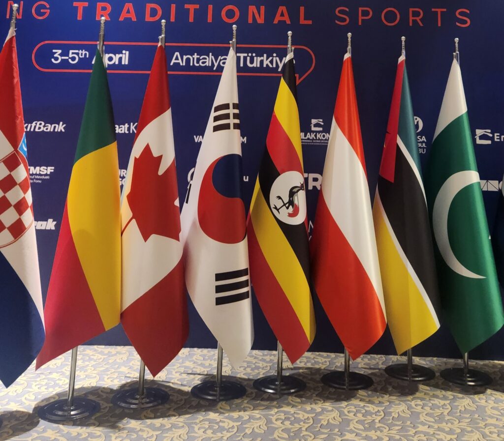 Uganda’s flag displayed among national flags at the Ethnosport Forum in Antalya, Türkiye.